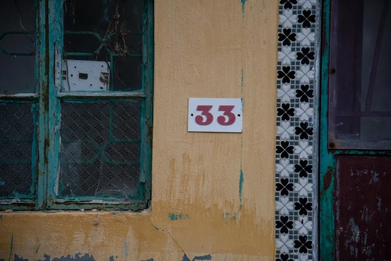 A number 33 on the wall of the building